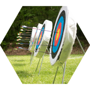 Archery range at Girl Scout Camp River Ranch, where Girl Scouts practice perseverance and patience as they take aim at new targets!